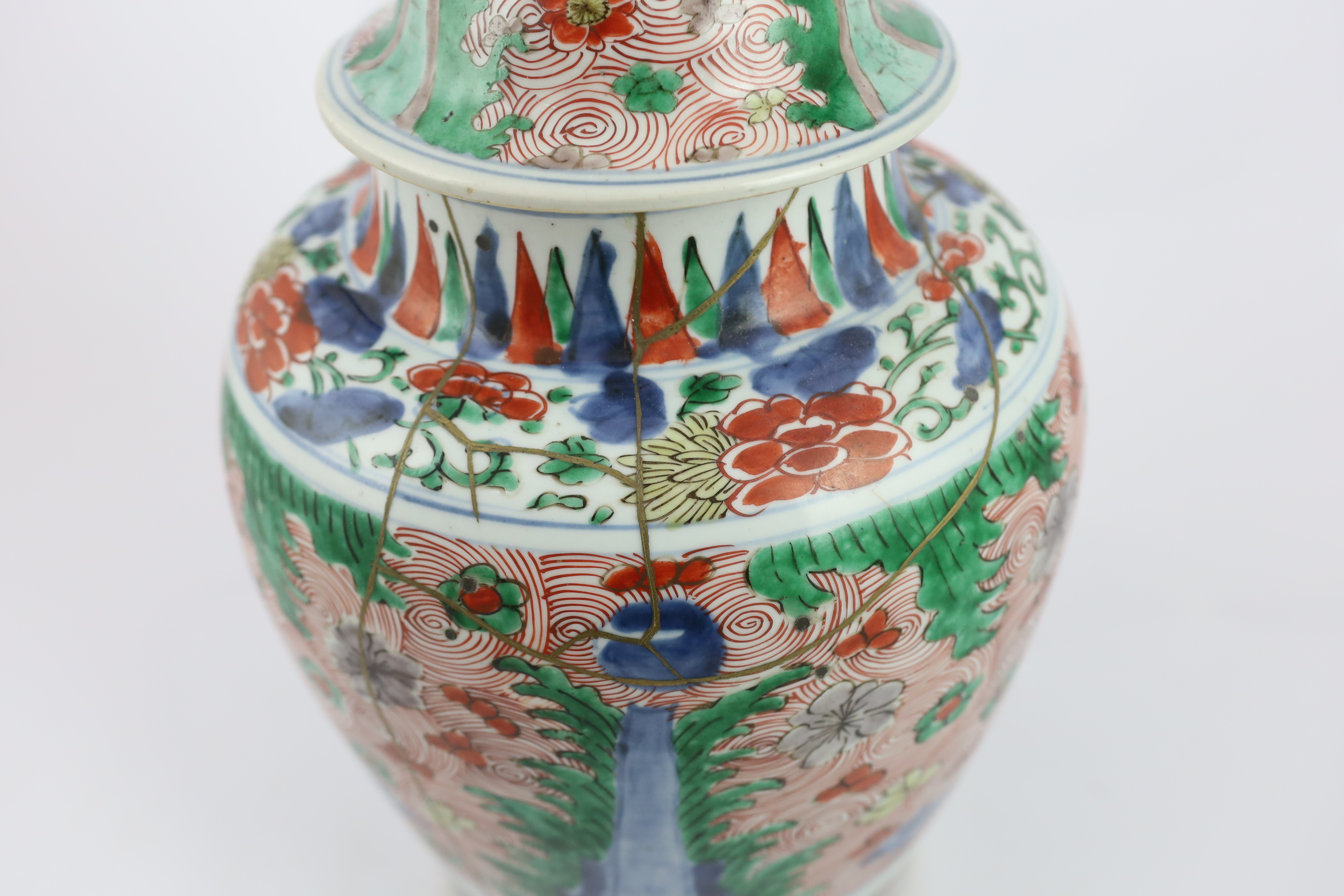 A Chinese wucai ovoid vase and cover, Transitional, Shunzhi period, broken with kintsugi style repair